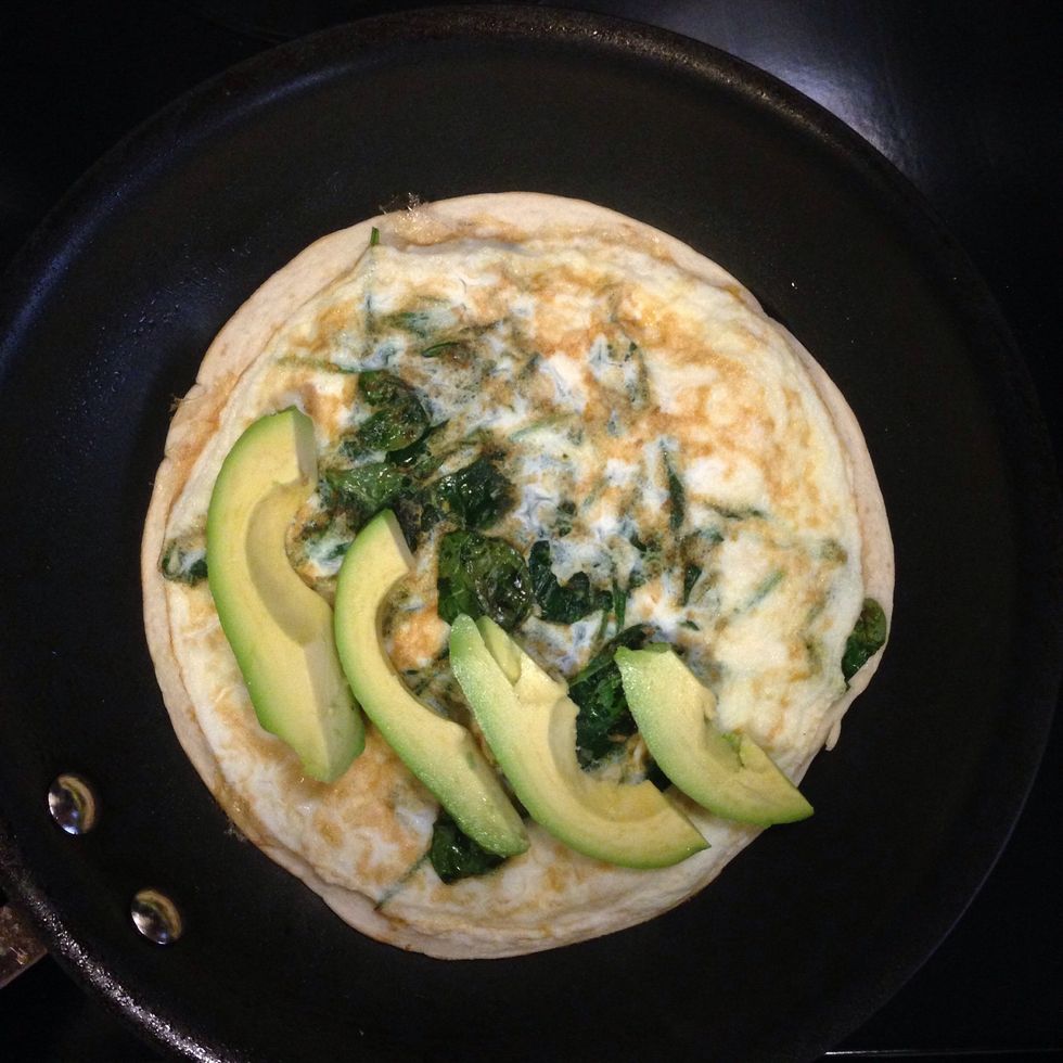 Add avocado slices.