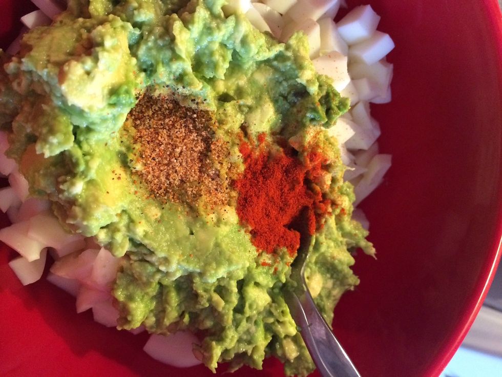 Add avocado to the eggs and add Slap Ya Mama and smoked paprika to taste. For this batch I used about 1 tsp paprika and 1.5 tsp SYM.