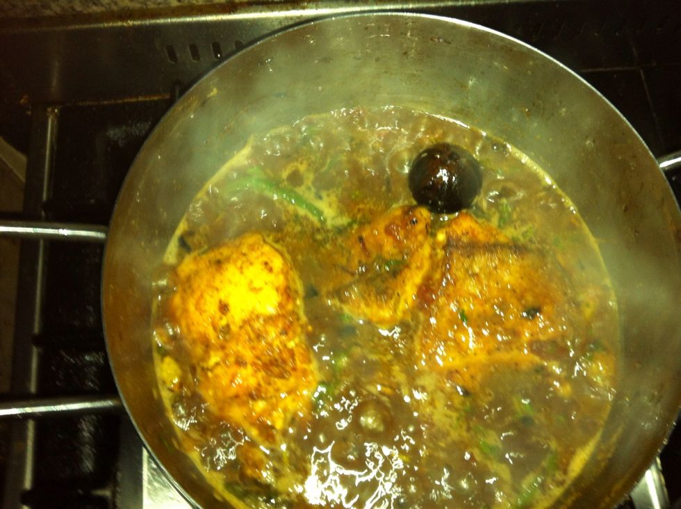 Add back the fish and cook it over high heat for about 5 minutes while covering the pot, taste the broth...it should be very salty but that's ok, you will need the salt to flavor the rice!