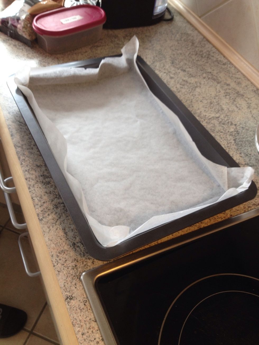 Add baking paper to a baking trey