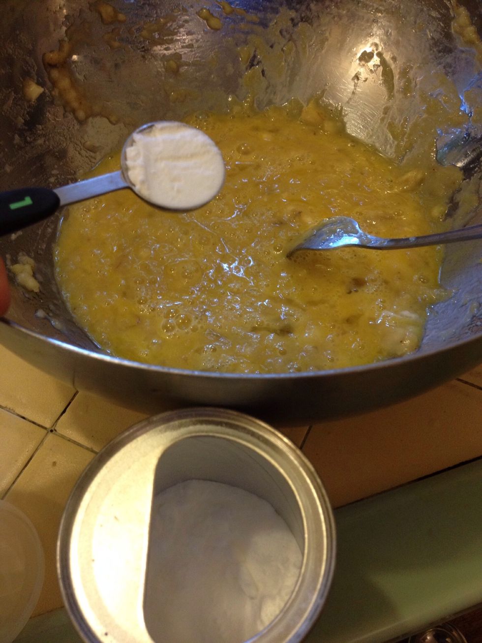 Add baking soda. Stir it in with the fork.