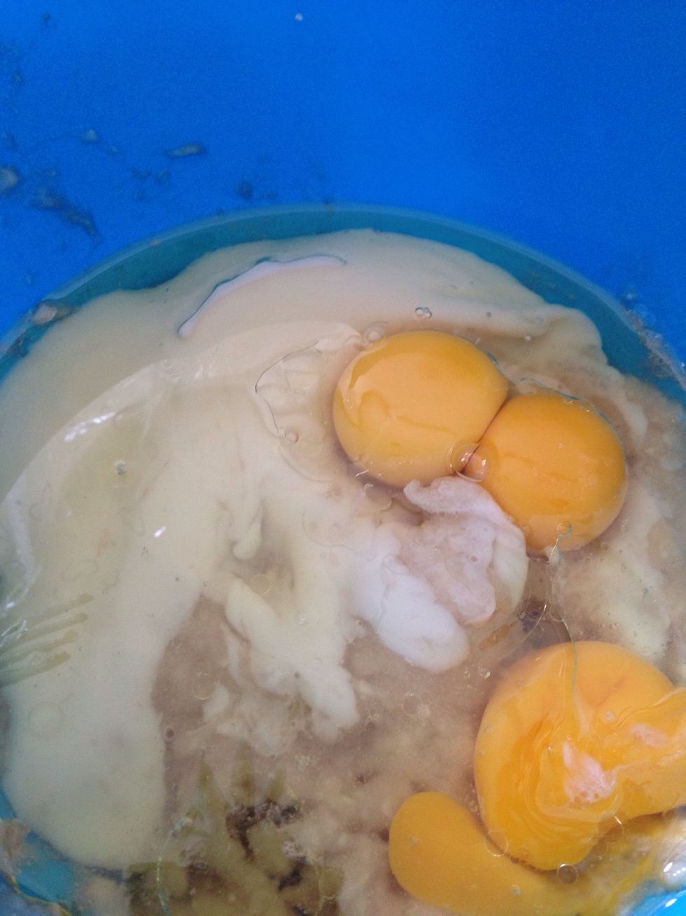 Add banana yogurt, coconut oil, and eggs. You welcome to use plain yogurt. If you using small egg like me, add 2 eggs and 1 egg yolk. Mix everything well.