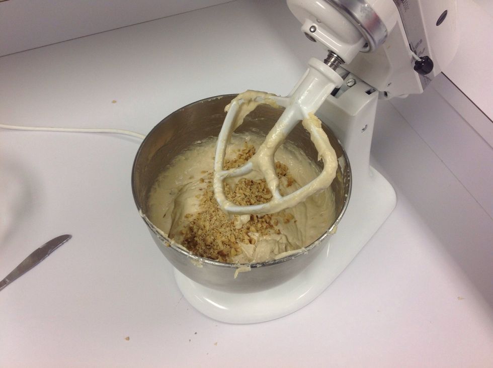 Add bananas and nuts into mixer.