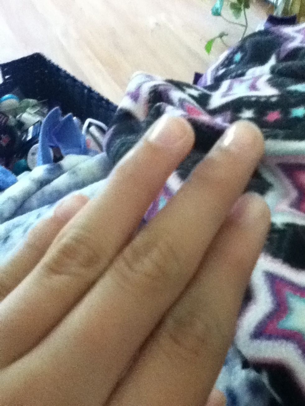 Add base coat of nail polish to your nails.