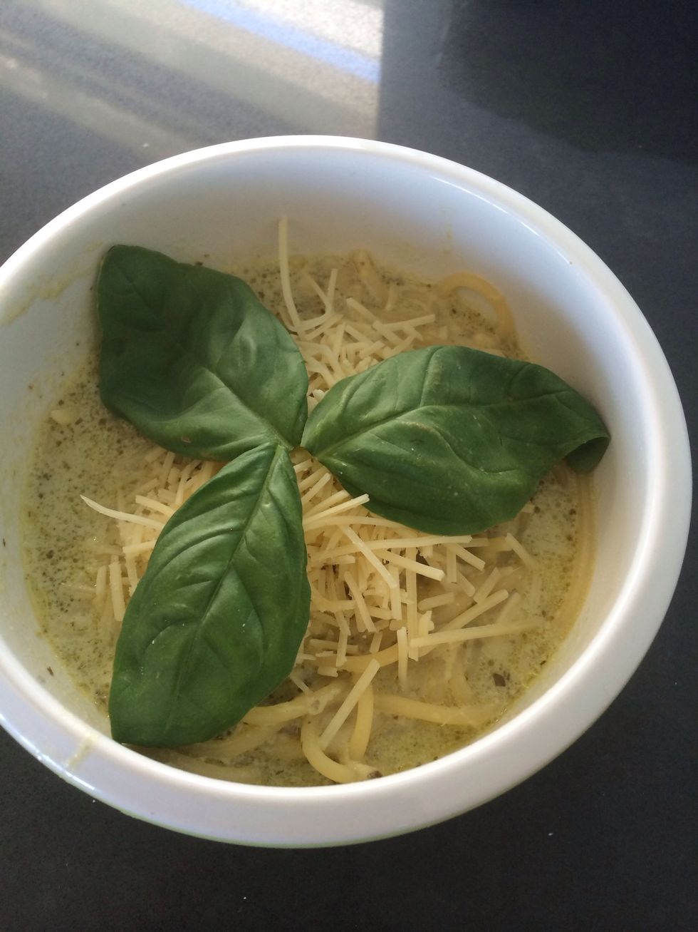 Add basil leaves for decoration.