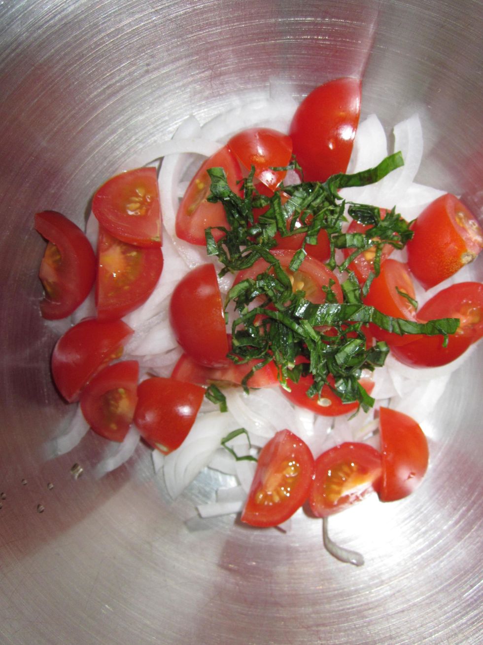 Add basil to onion and tomatoes