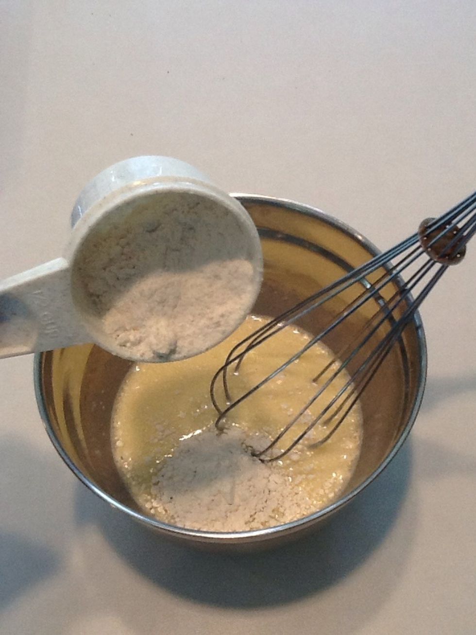 Add batter slowly to mixture, whisking well after each addition.