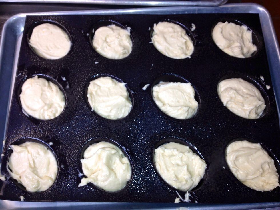 Add batter to top of each mold