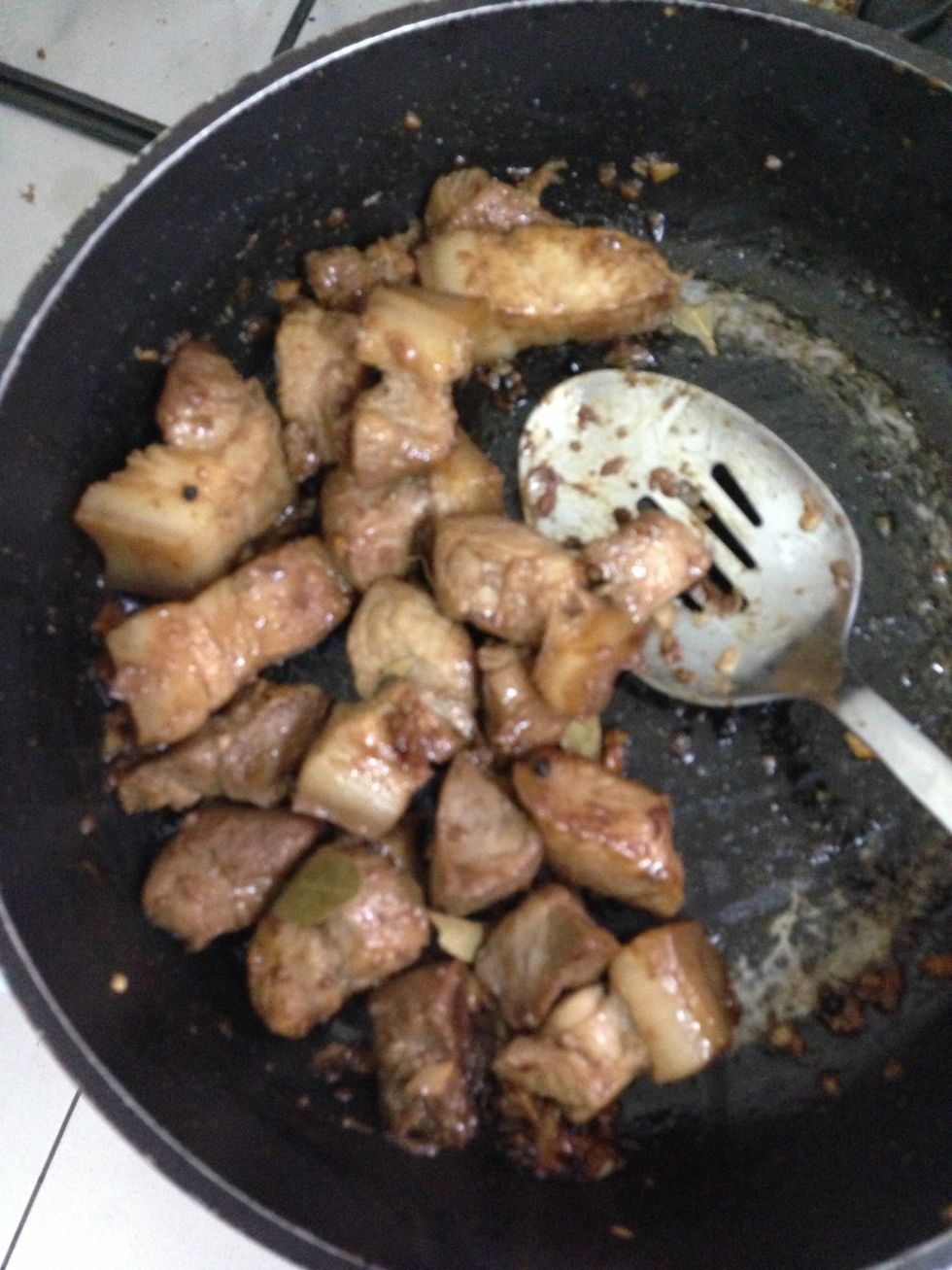 Add bayleaf, vinegar, pepper corn, & soy sauce