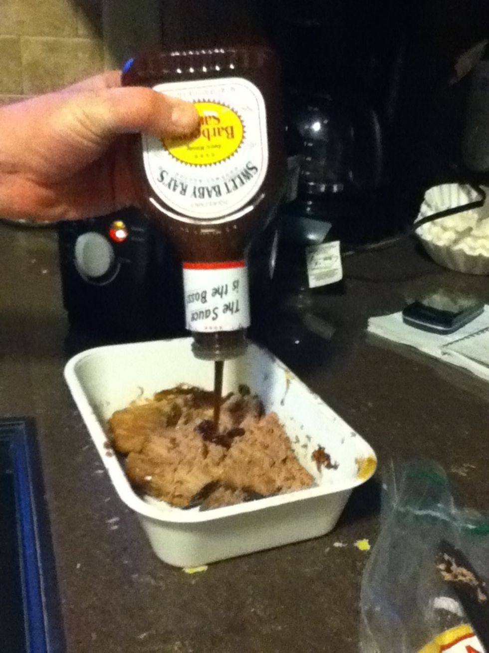 Add BBQ to taste, the more the better...we use half an 18 oz bottle...and continue shredding