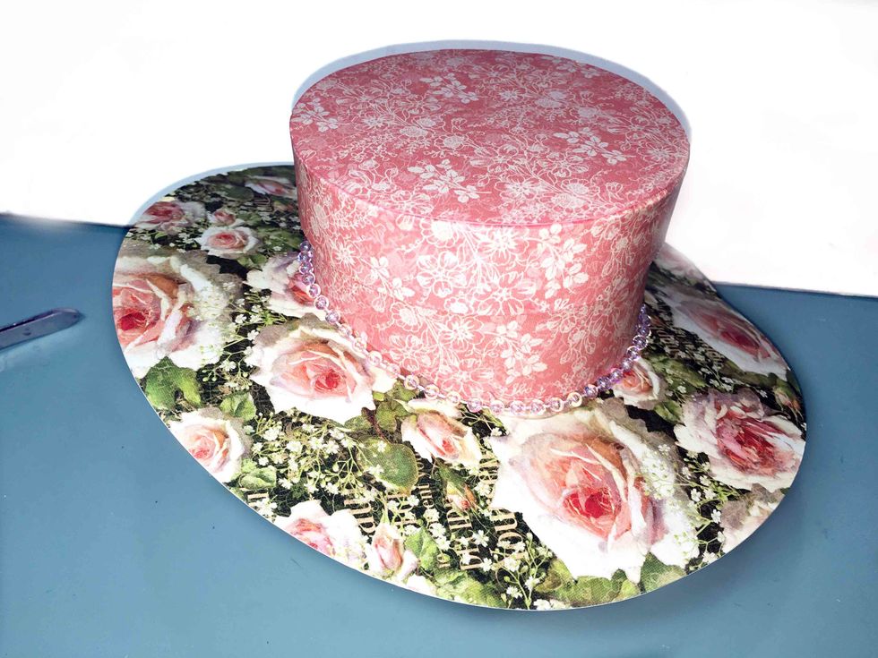 Add beads around the hat where the crown and brim meet.