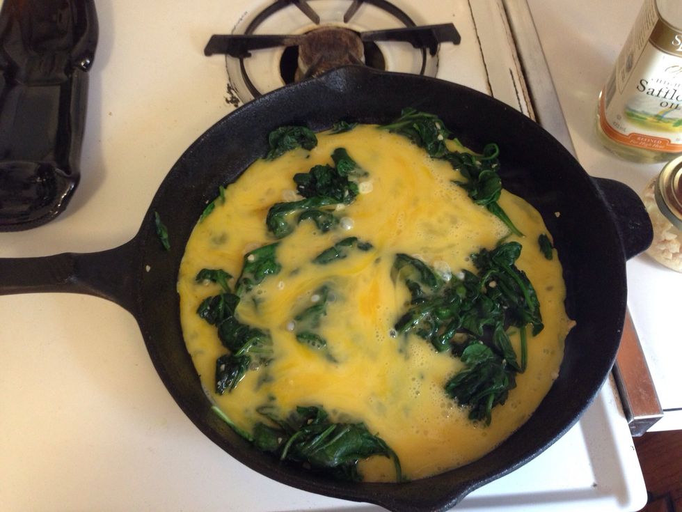 Add beaten eggs, cook until eggs are done.