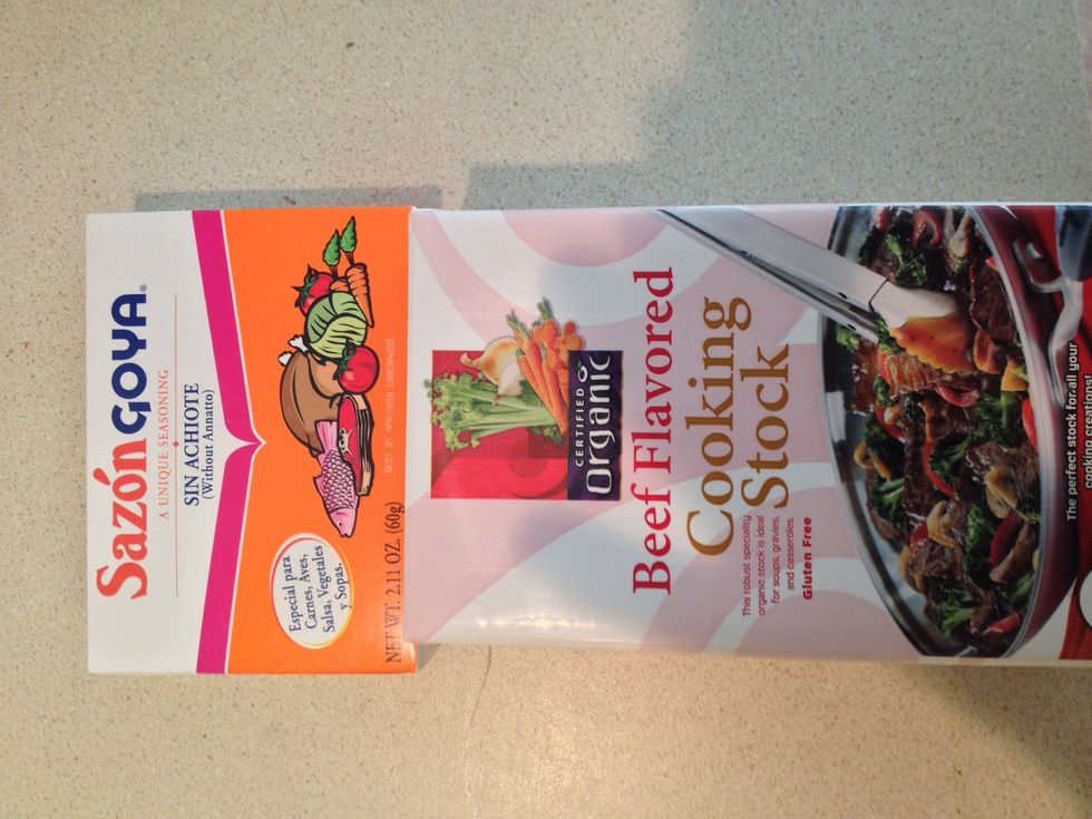 Add beef stock and 2 packets of Sazon Goya