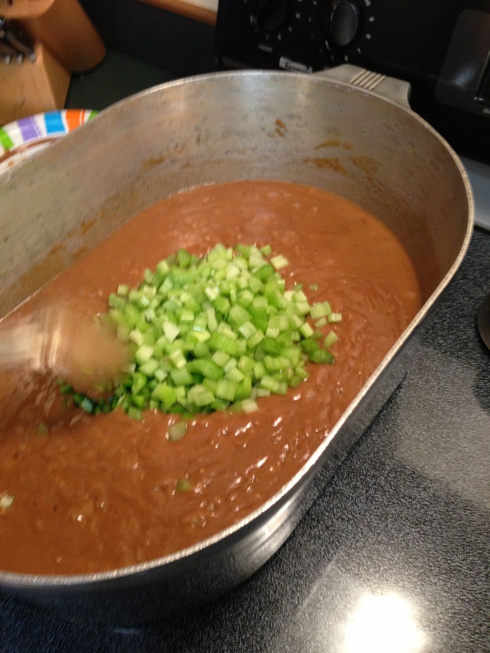 Add bell pepper, celery and green onion and tablespoon of Tonys to taste, simmer and keep stirring for 15 minutes.
