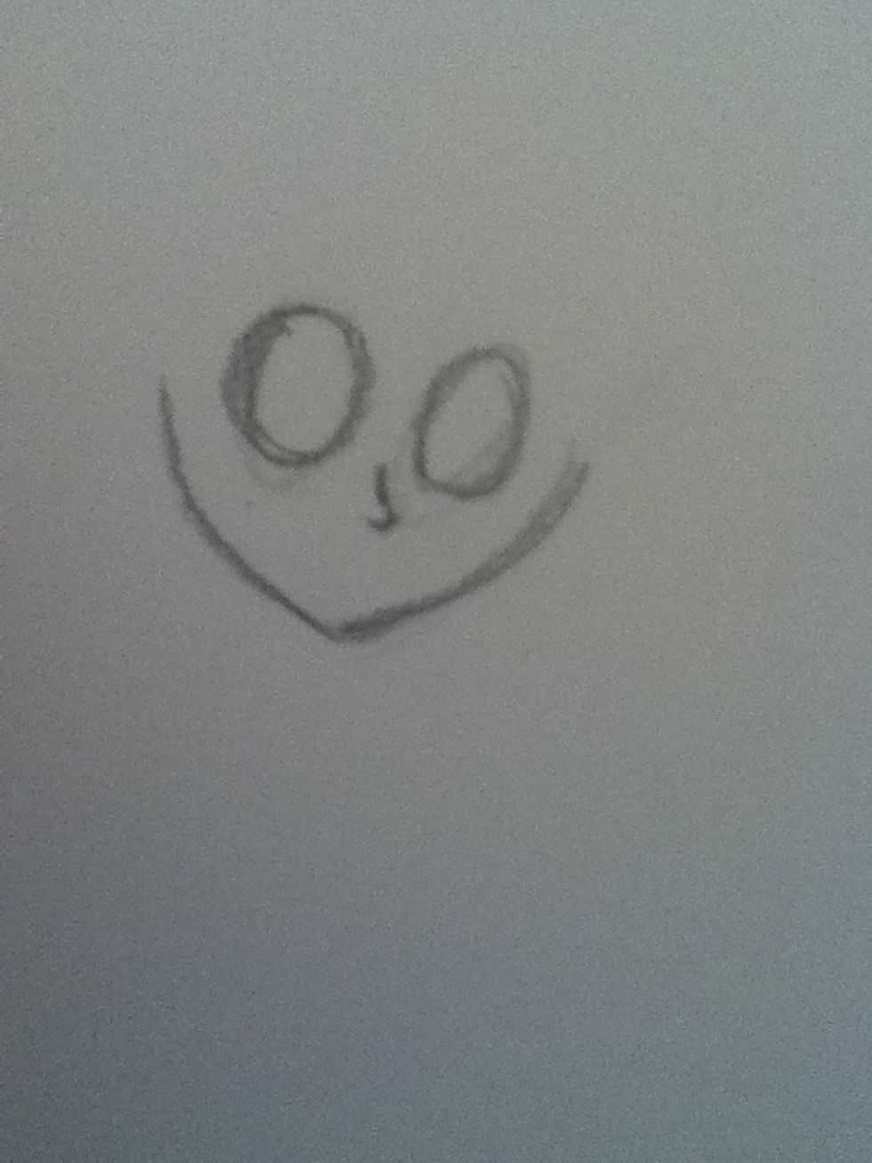 Add big oval eyes and a small nose