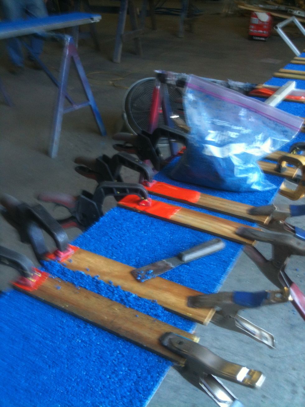 Add binder to the surface area of the slat and then press the prepared granules into the form and square of the edges with a small pieces of wood.