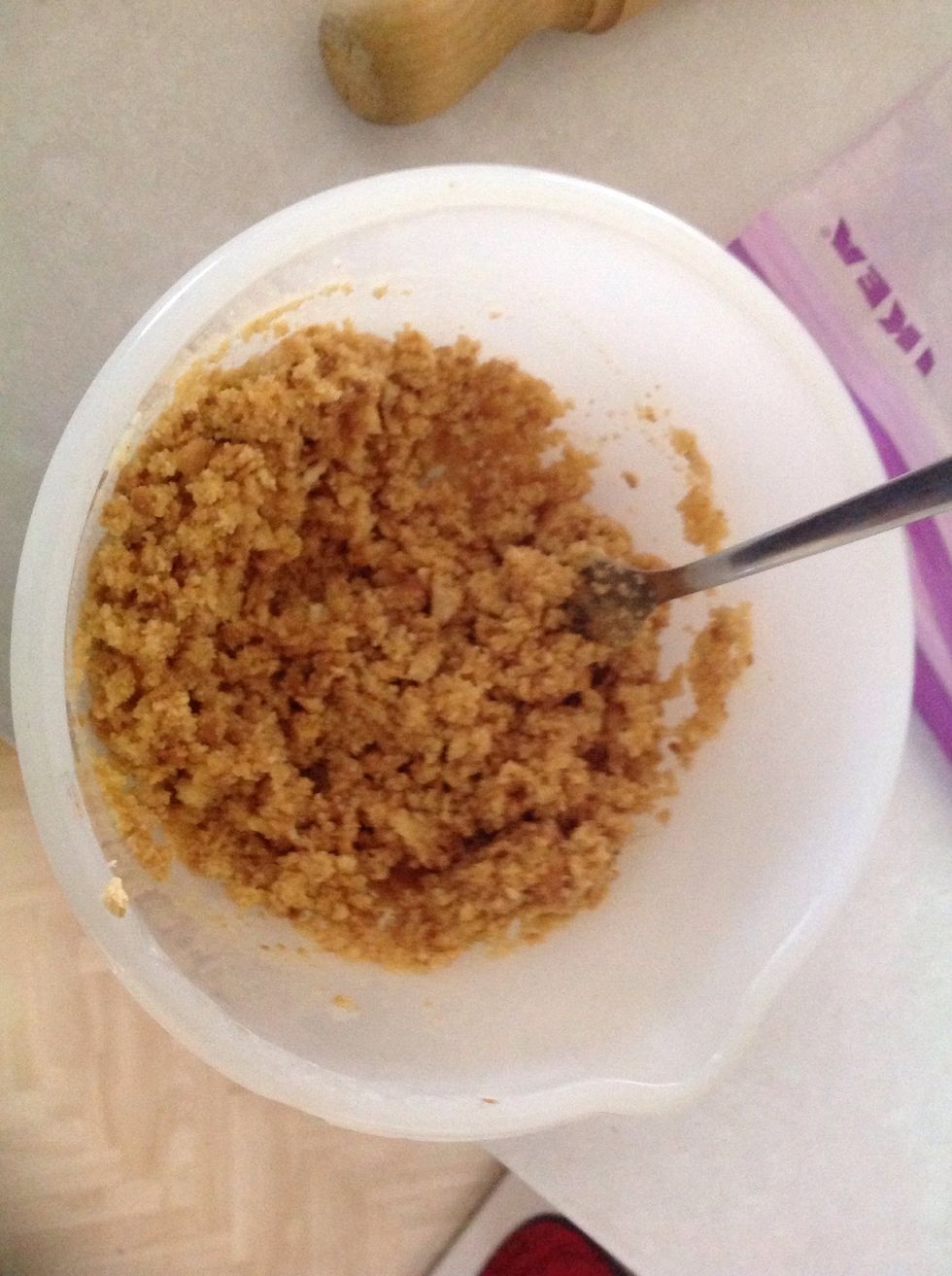 Add biscuits and butter together