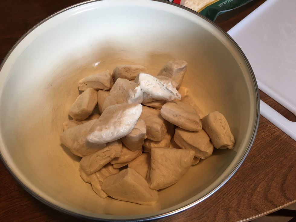 Add biscuits to a mixing bowl