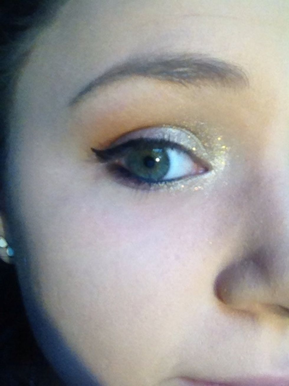 Add black pencil liner to bottom waterline.