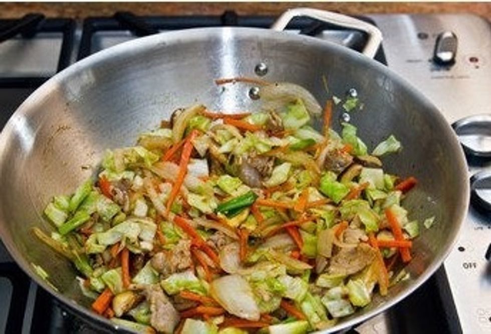 Add black pepper and 3 tbsp. of Yoki Soba sauce or the package from Yoki Soba nuddles.