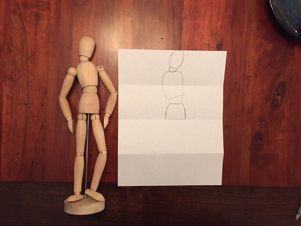 Add Bob's hips. Bob's hips are straight, not tilted. Bob's hips end on the middle fold.