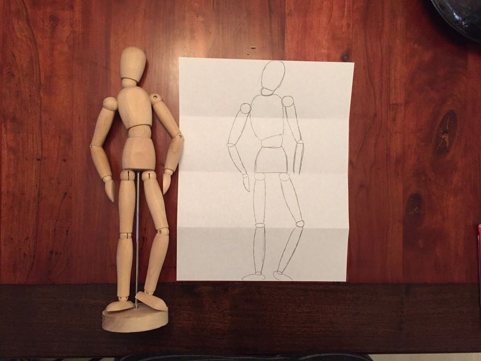 Add Bob's lower arm. Bob's lower arm should end at Bob's hip joints.