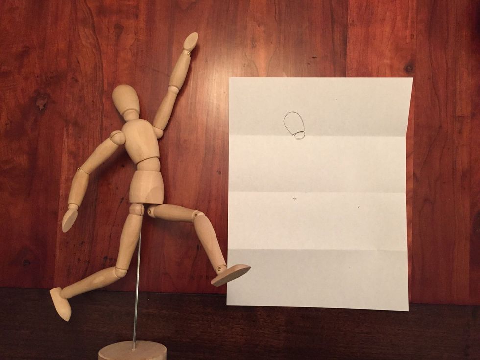 Add Bob's neck. An oval on the fold.