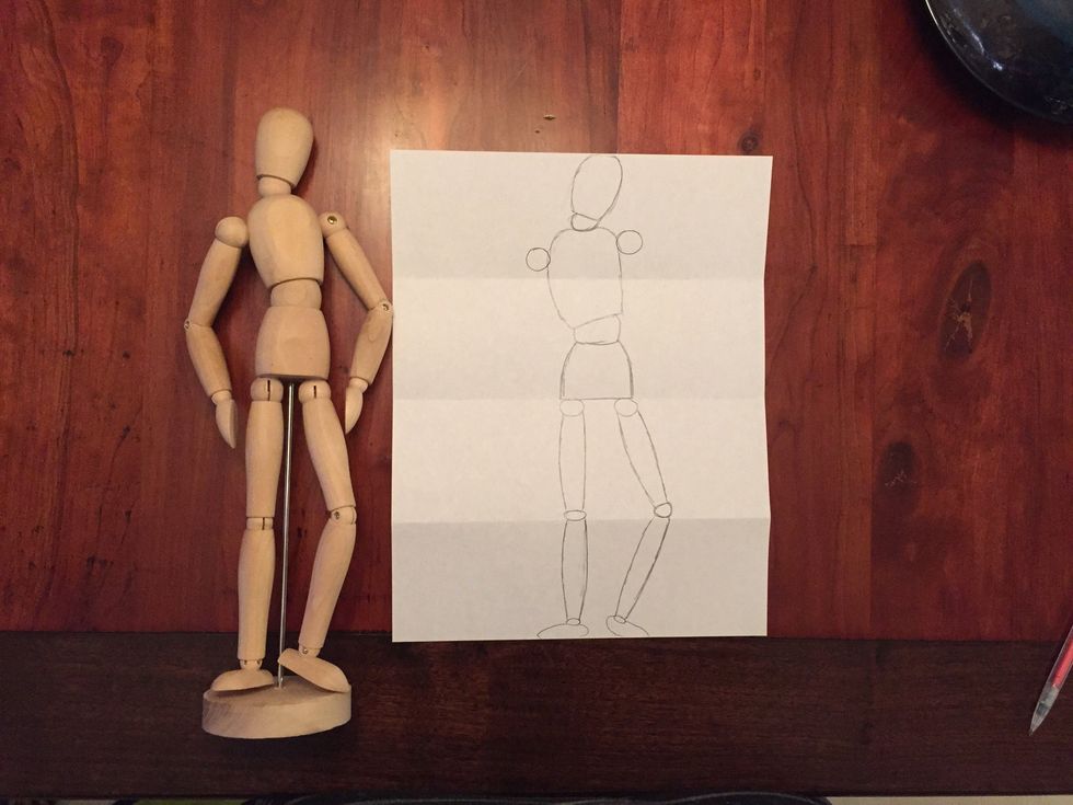 Add Bob's shoulders. Circles on the side of Bob's upper chest. Notice Bob's right shoulder is higher.