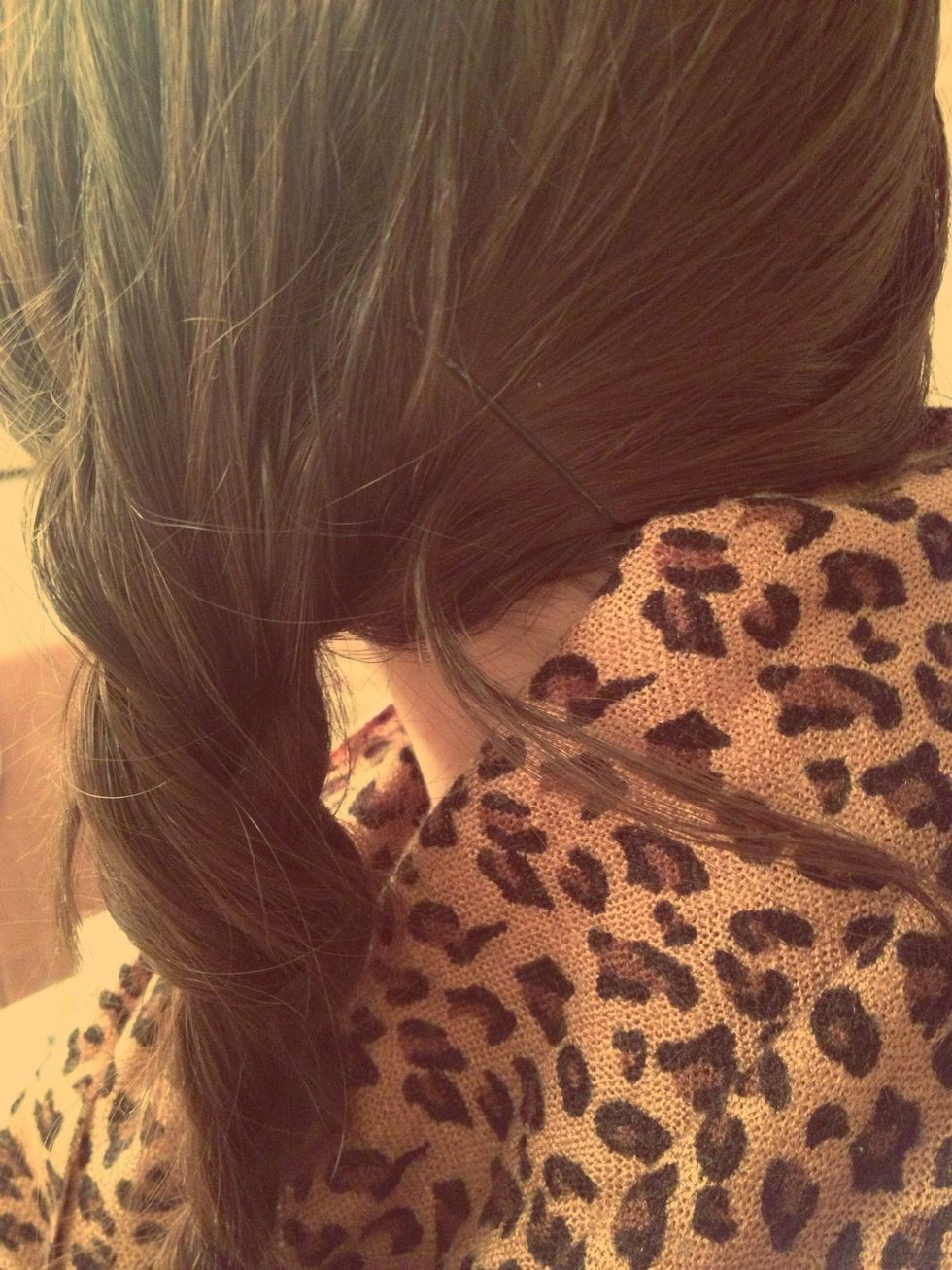 Add bobby pins on the back of your head for any hair that did not reach the braid from the other side.