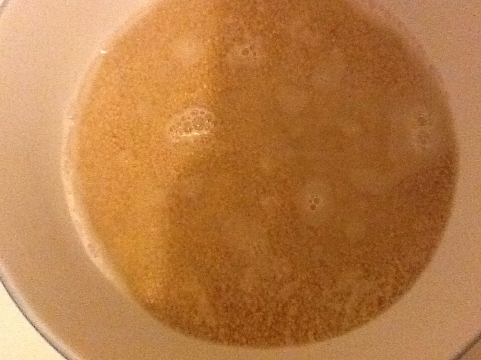 Add boiling water to couscous, cover and let sit for 10 minutes