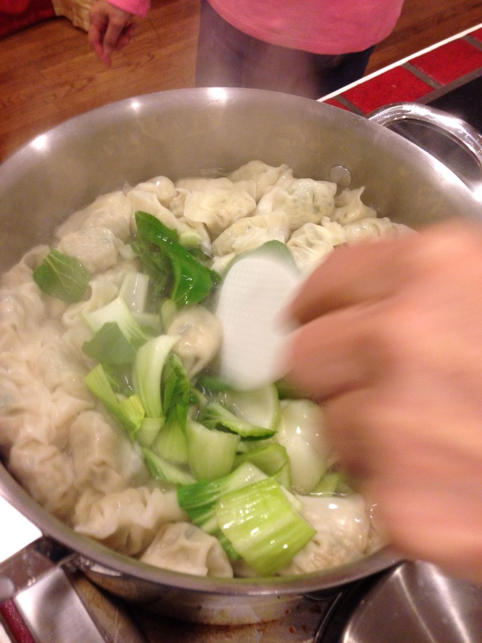Add bok choy and cook for a couple minutes more or until bok choy is tender.