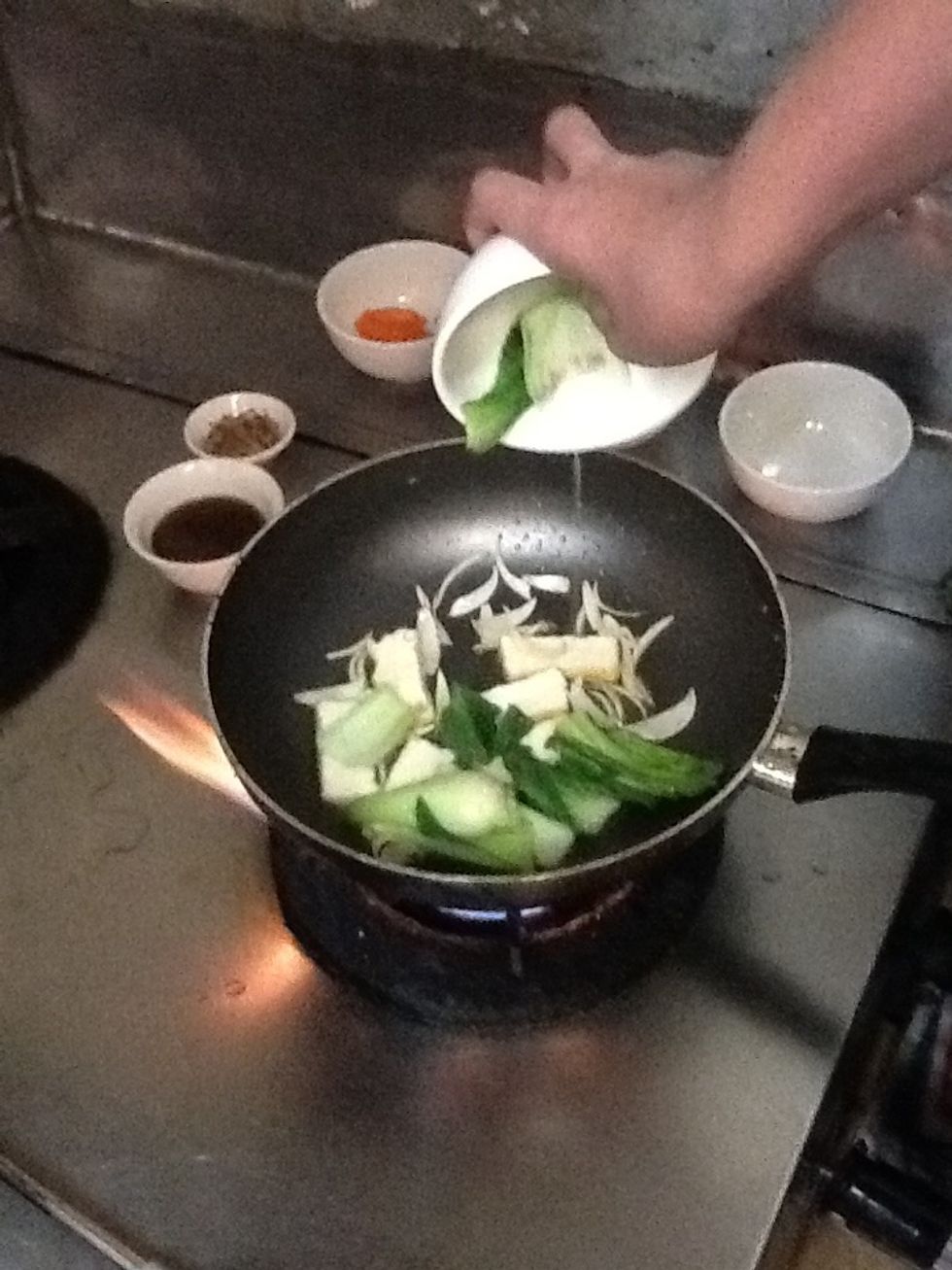 Add bok choy into the pan