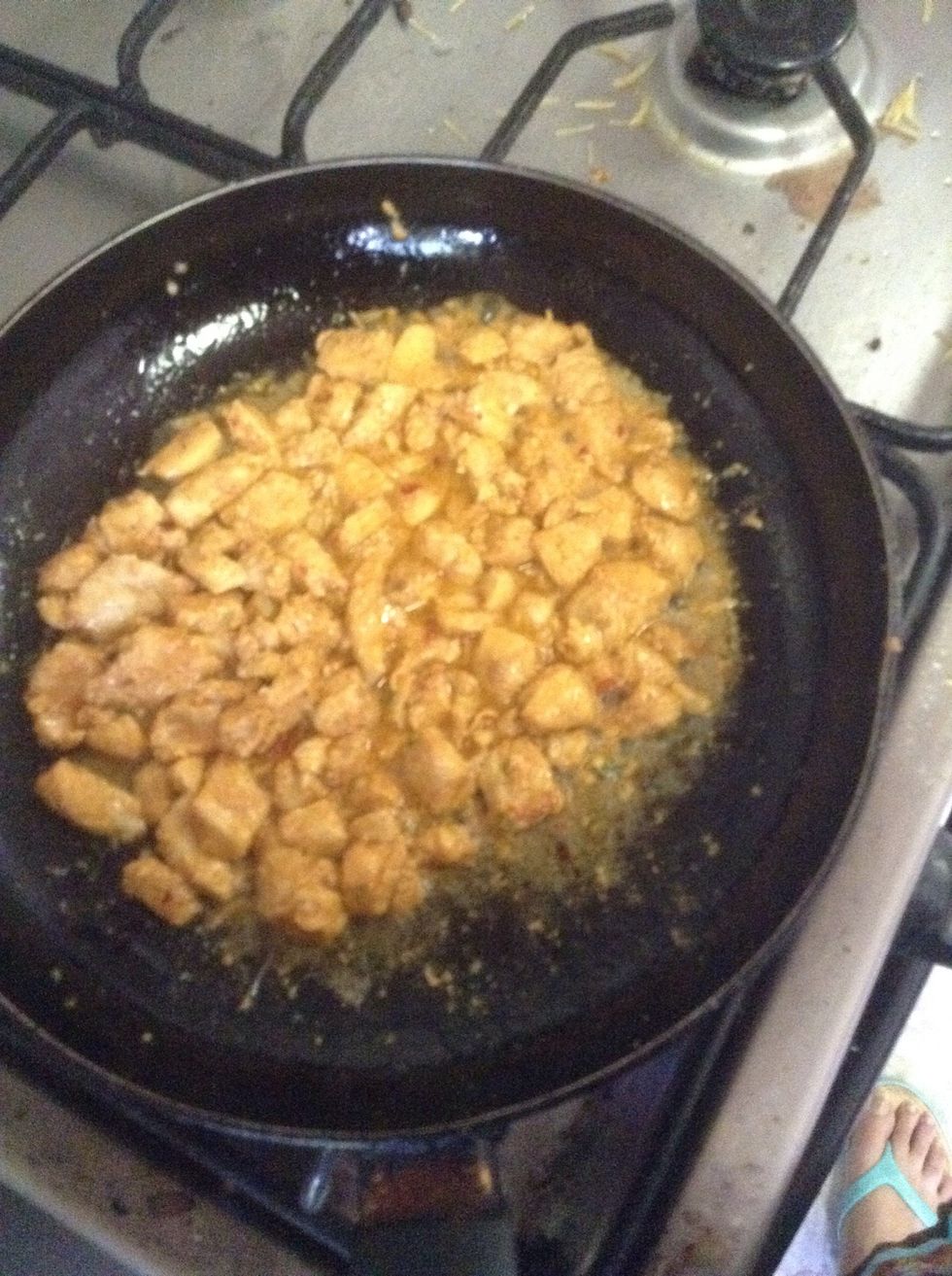 Add boneless chicken cubes in pan over 3 tbsp of oil and add 4 tbsp of Shan tikka masala. And fry until golden color