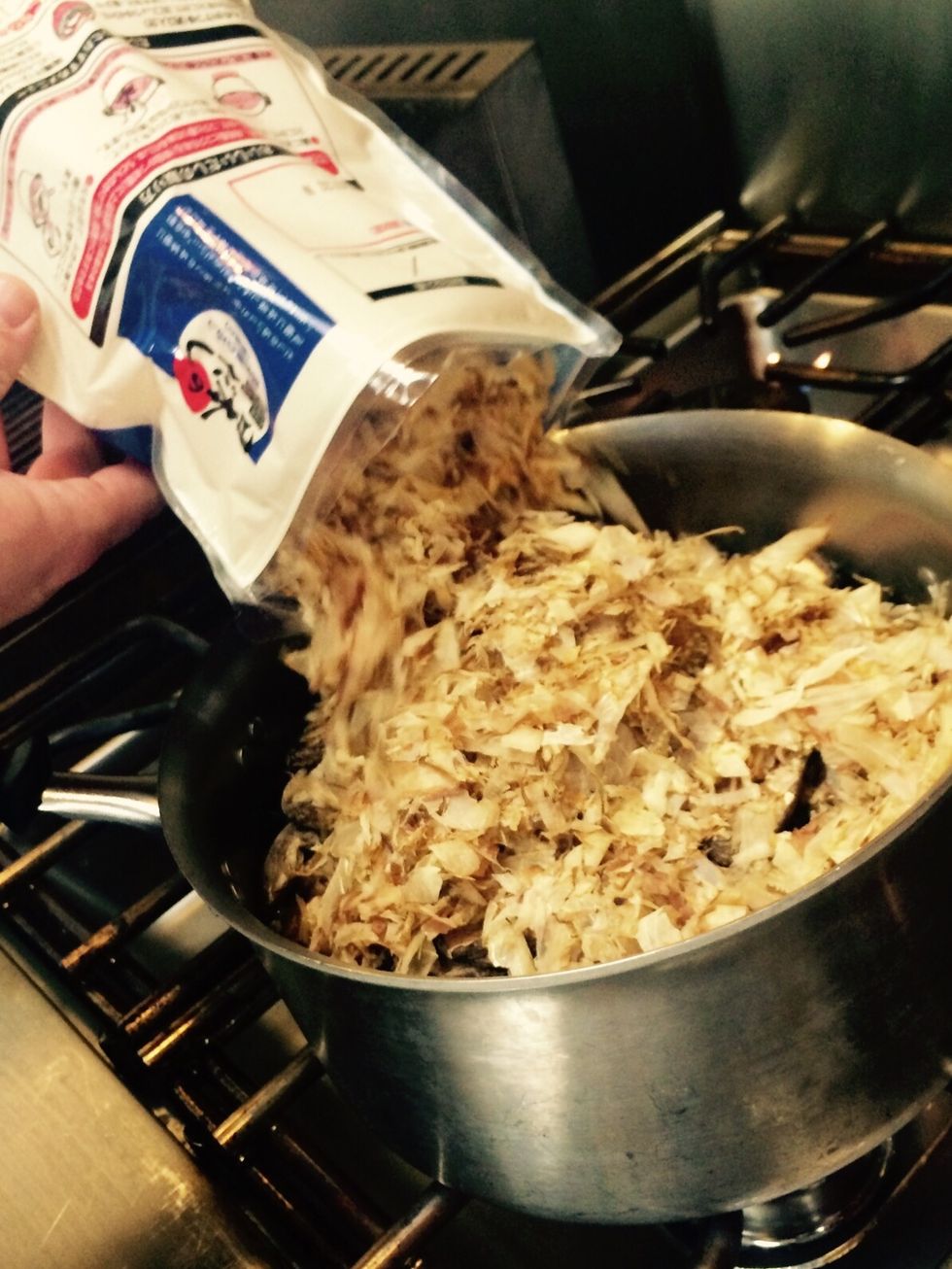 Add bonito and bring to a simmer