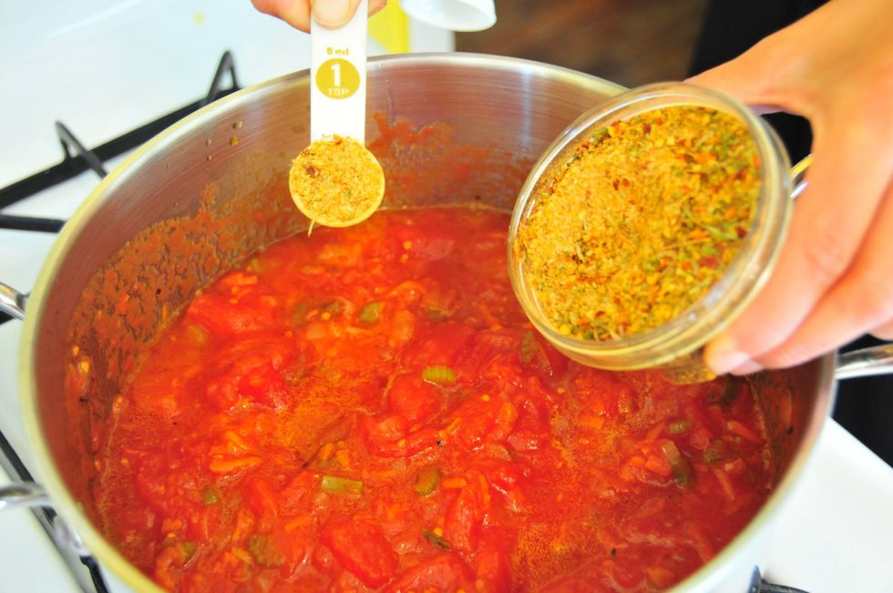 Add both cans of tomatoes along with 2 teaspoons of the Italian blend.  Adding flavor in layers is a good rule to remember.  When you add something new to a pan, it will need a little seasoning too.