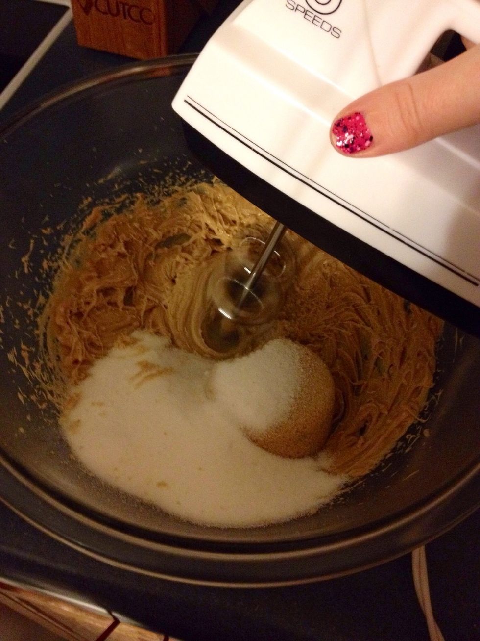 Add both sugars (1/2 cup of each), baking powder (1/2 tsp) and baking soda (1/2 tsp). Mix further until well blended, scraping down sides of bowl.