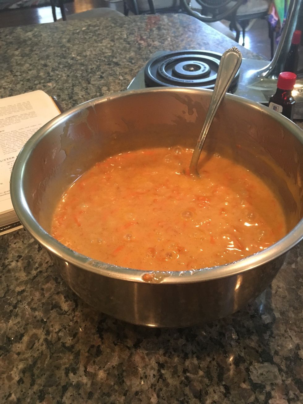Add both the vegetable oil and the vanilla extract into the cake batter with the previous ingredients. Mix the batter well.
