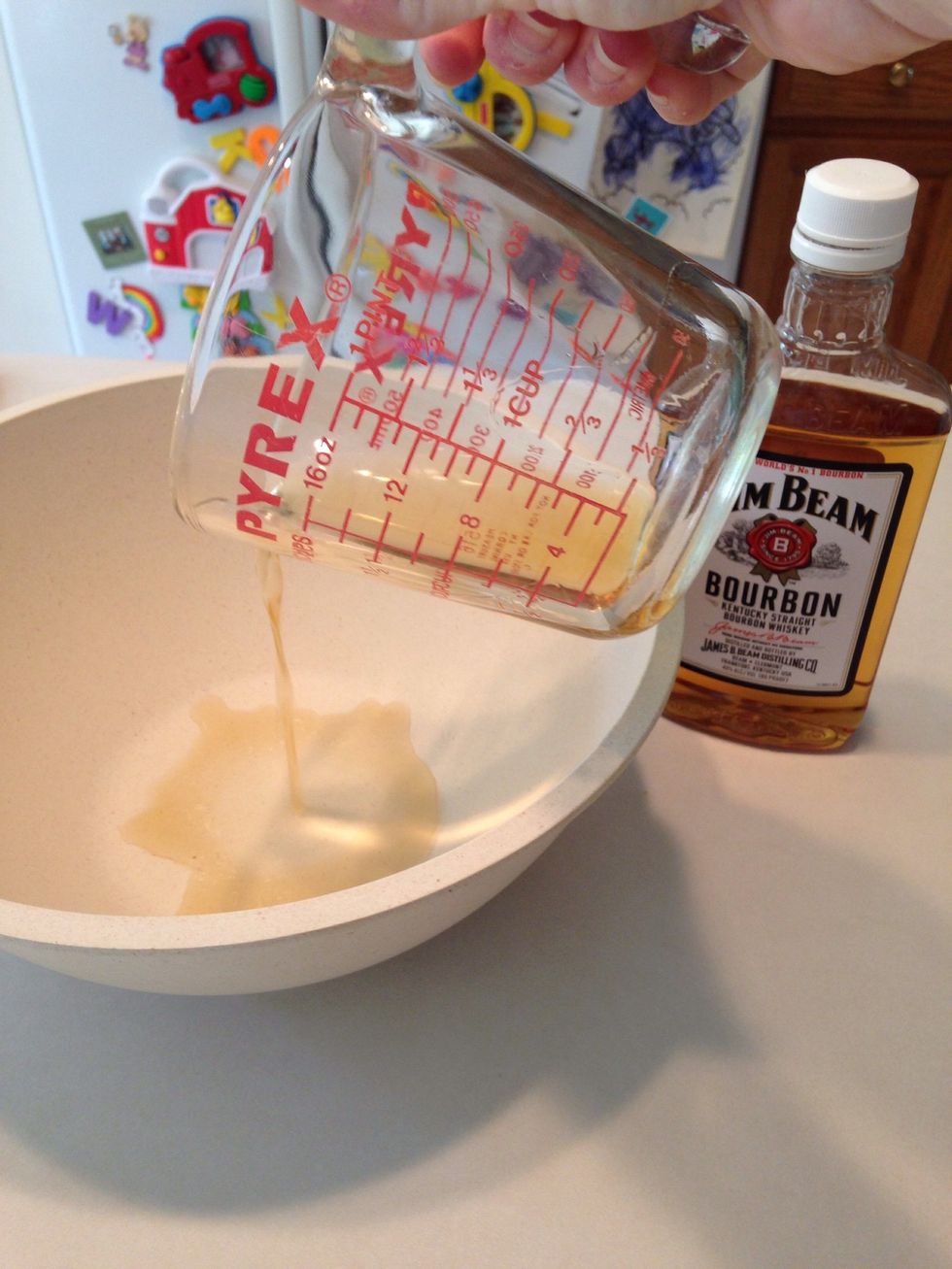 Add bourbon to bowl.