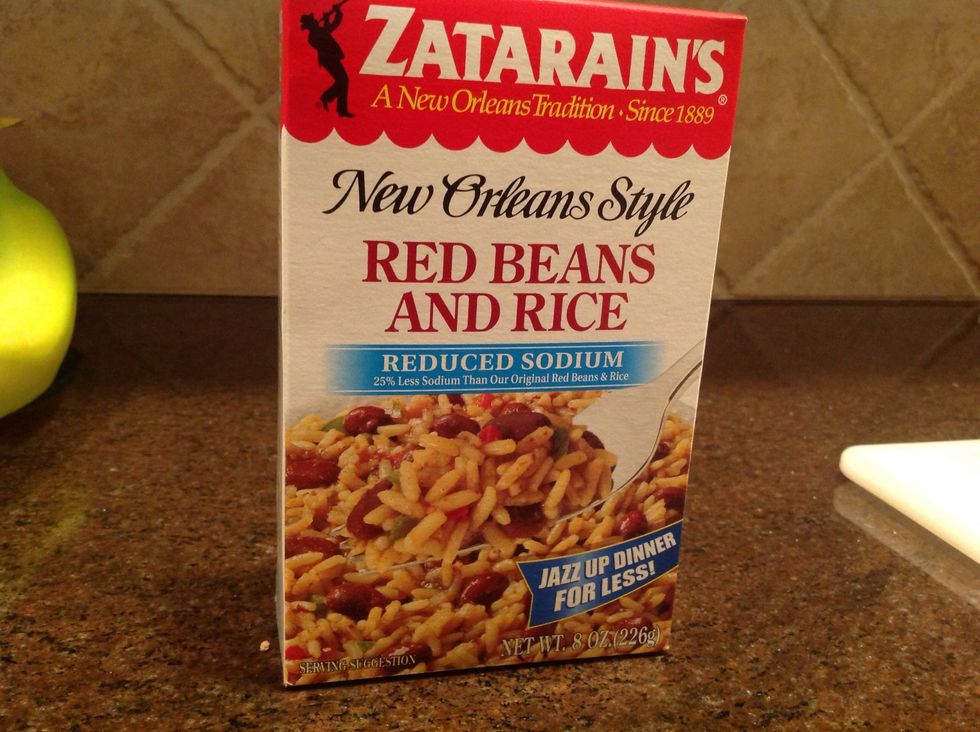 Add box of Zataran's to the skillet with sausage & veggies.