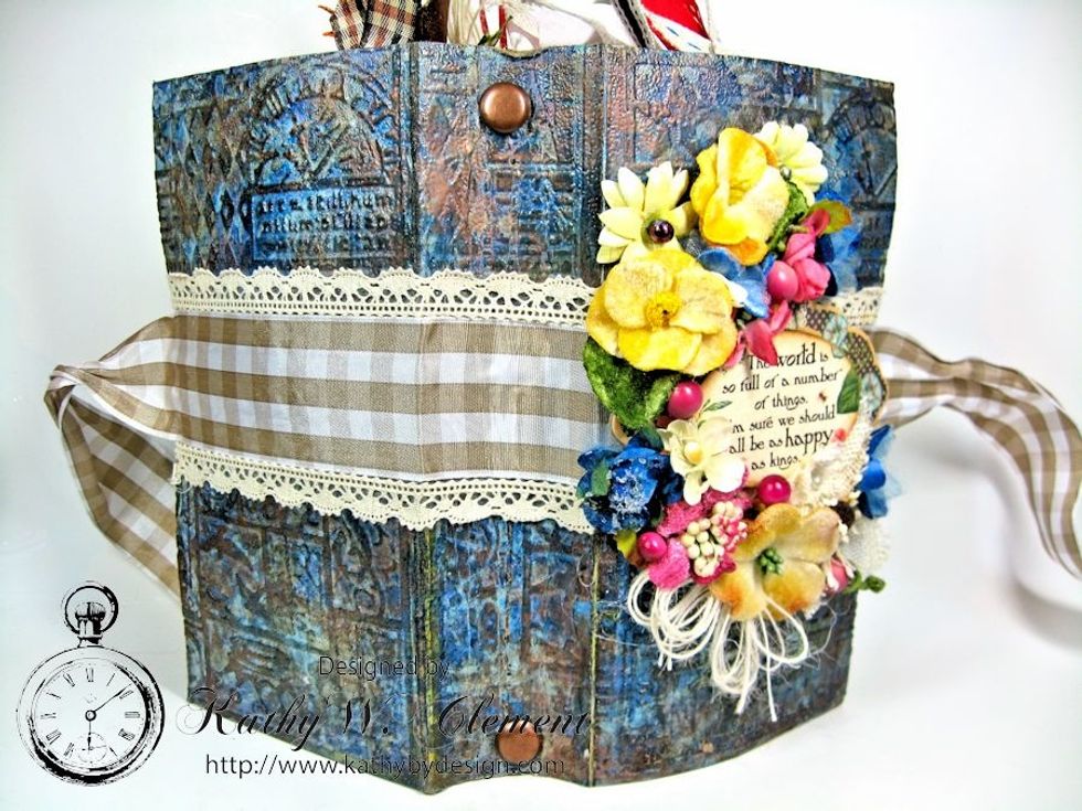 Add brads or charms to the spine if desired.