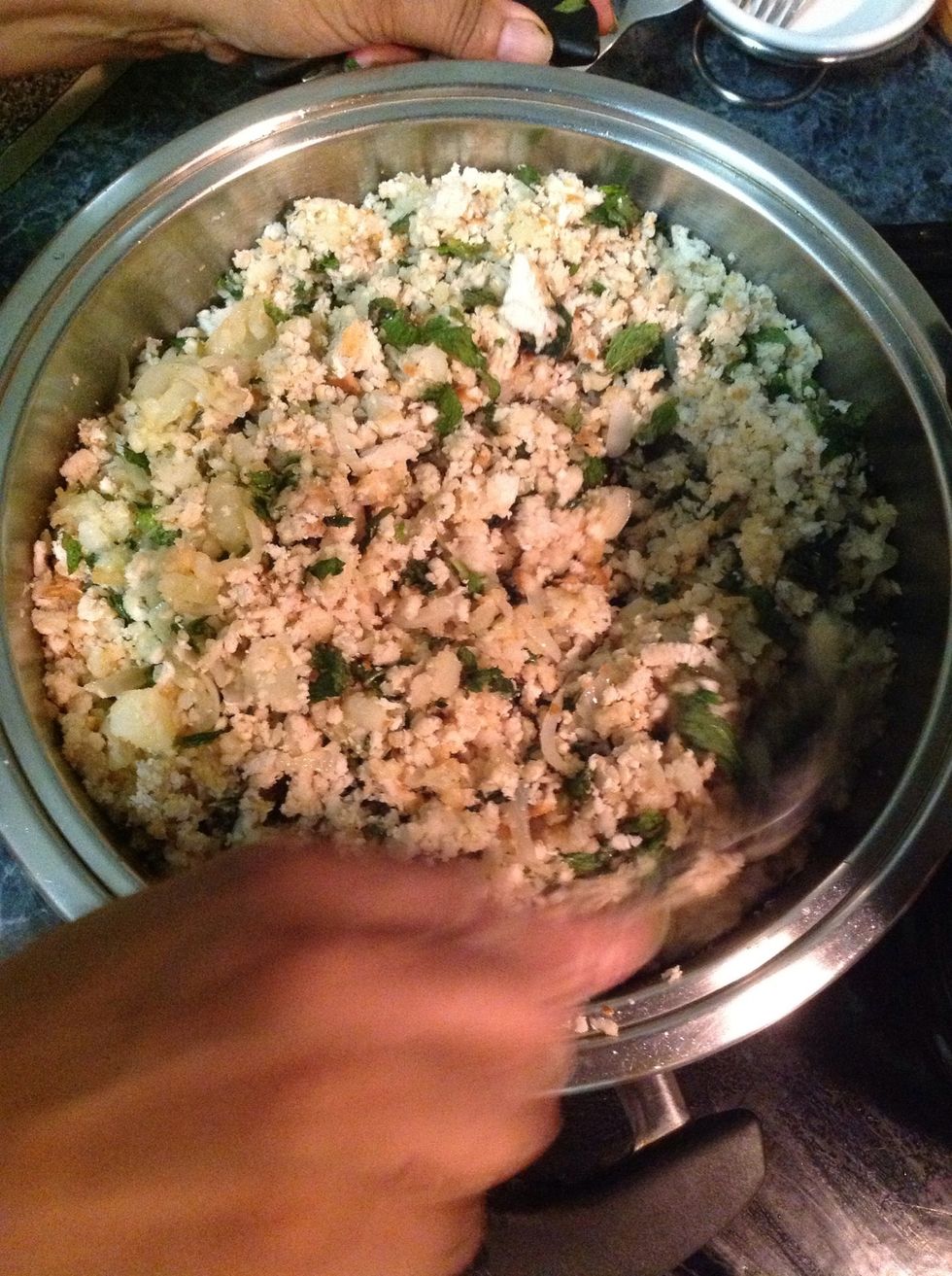Add bread (with mint and potato mixture) to browned onions, add in salt to taste and allow to cook through