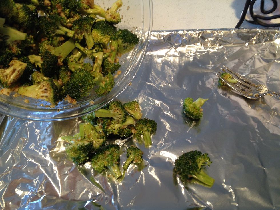 Add broccoli mixture to a foil covered cooking sheet.