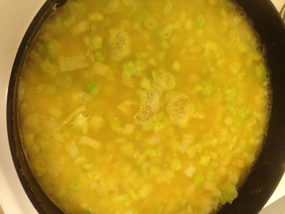 Add broth, simmer until thick.