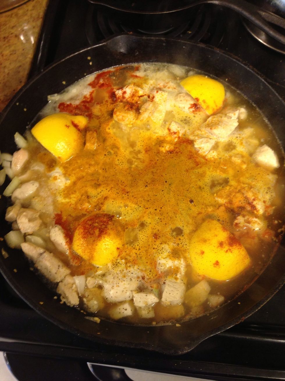 Add broth, wine, lemon, gingeroot, paprika, turmeric, & pepper. Bring to a boil & then reduce heat & simmer for 20 mins or until chicken is no longer pink.