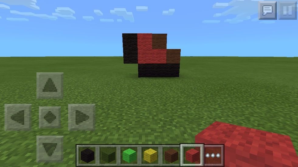 Add brown on the right hand side of the red, then on top of the last red. Add one more red, on top of the first one.