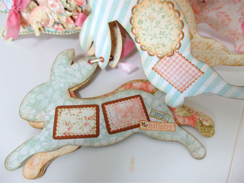 Add Brown paper with stamp cutting paper and write the stitches then Add Baby 2 Bride Cardstock Stickers