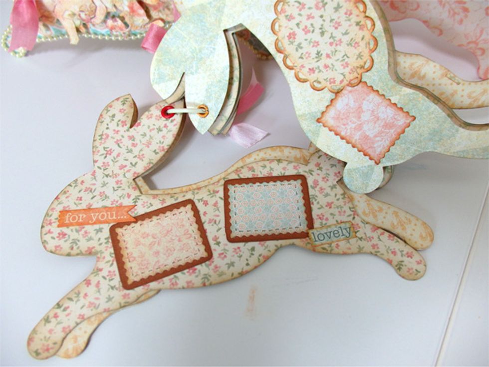 Add Brown paper with stamp cutting paper and write the stitches then Add Baby 2 Bride Cardstock Stickers