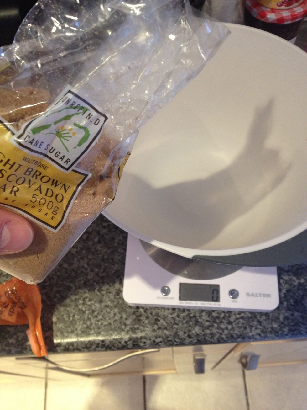 Add brown sugar to a mixing bowl...