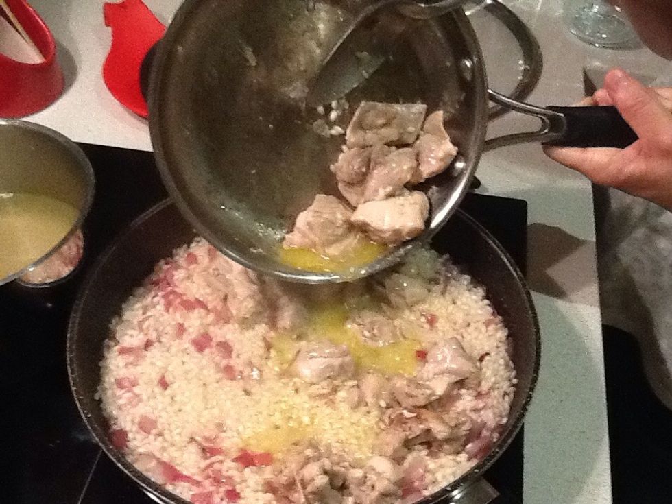 Add browned chicken to the rice mixture and stir.