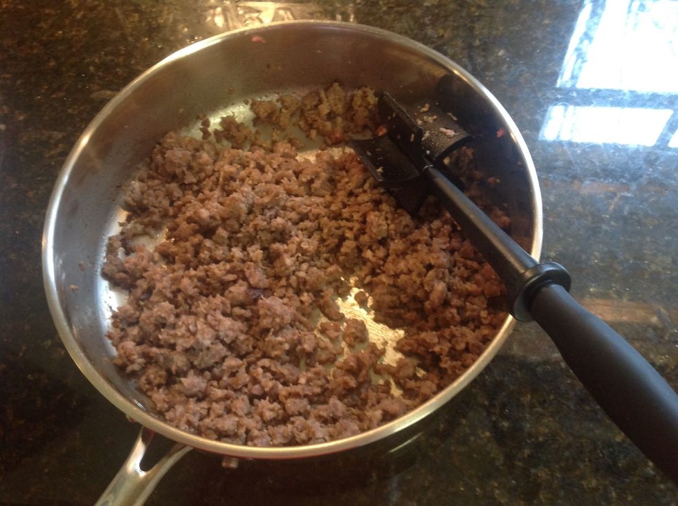 Add browned sausage to the slow cooker